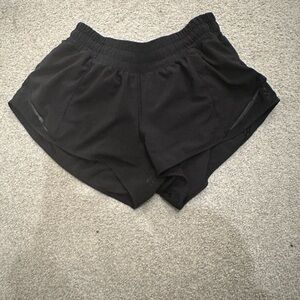 Black lululemon hottie hot 2.5 inch shorts size 4.